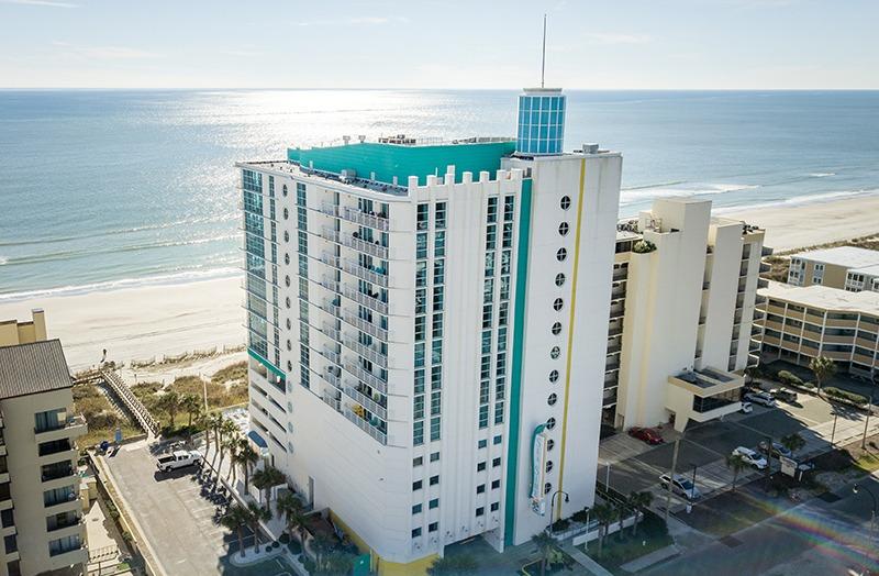 Aerial view of Seaside Resort with the ocean in the background